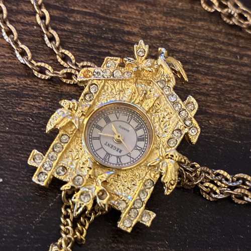 Collana con ciondolo orologio