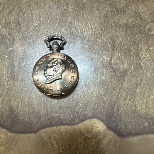 Collana con ciondolo orologio
